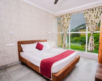 Tulips Valley View Resorts - Ooty - Bedroom