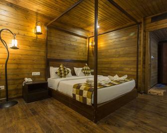 Tsg Aura - Lakshmanpur - Bedroom