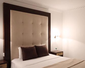 Hotel Titopolis - Playas - Habitación