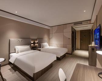 Hanting Hotel Rugao Anding Plaza - Rugao - Bedroom