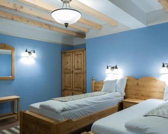 Pensiunea Colt de Rai - Beliş - Habitación