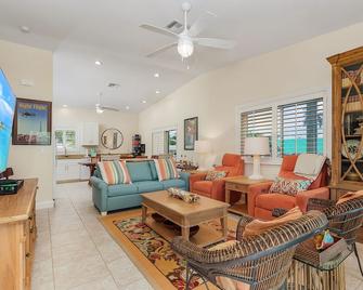 Reel Paradise! 2/2 with So Much Waterfront! Boat Lift Included! - Saint James City - Living room