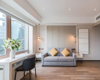 Beijing Pudi Hotel - Peking - Wohnzimmer