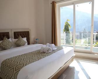 Hotel Yog Tapovan- Rafting Available - Rishikesh - Bedroom