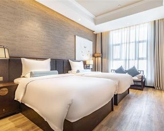 Yunyi Zizai Hotel (Hohhot Meteorological Bureau Military Area) - Hohhot - Bedroom