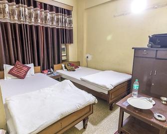 Hotel Linkway Deluxe - Patna - Schlafzimmer
