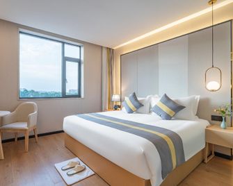 Rezen Select Hotel Mianyang - Mianyang - Bedroom