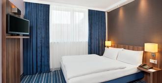 Holiday Inn Express Augsburg - Augusta - Camera da letto
