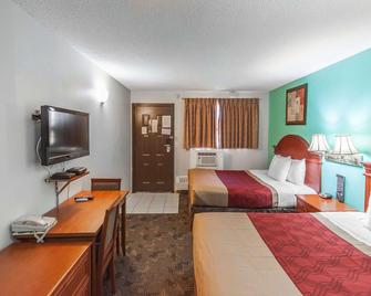 Econo Lodge Inn & Suites - Drumheller - Bedroom