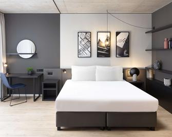Radisson Hotel & Suites Zurich - Opfikon - Спальня