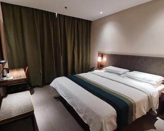 Motel Langfang High-speed Railway Station Xinchaoyang Shopping Center - Langfang - Schlafzimmer