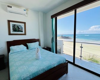 Hotel Sierra Negra - Puerto Villamil - Camera da letto