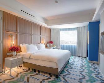 Java Paragon Hotel & Residences - סוראבאיה - חדר שינה