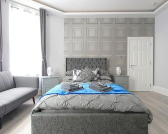 Hackney Suites - En-suite rooms & amenities - Londres