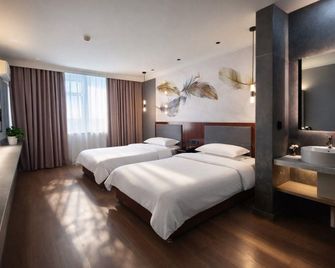 Changningyuan Hotel - Changji - Bedroom