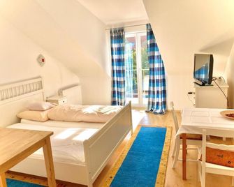 Gästezimmer Puzwidu - Wien - Schlafzimmer