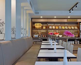 بي آند بي هوتول ويرزبورج - ورزبورغ - مطعم