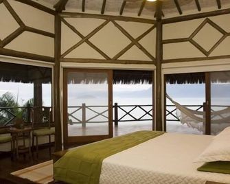 Pousada Singuitta - Ilhabela - איליאבלה - חדר שינה