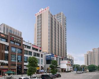 Vienna International Hotel Dongguan Shilonghuixing Business Central - Dongguan - Gebäude