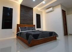 Long barn house in a lifestyle block property. - Dimiao - Bedroom