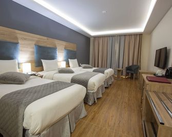 Petra Moon Hotel - Wadi Musa - חדר שינה