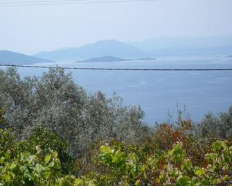 Fantastic natural stone house with 180° sea view, pool and beautiful garden - Kalamos