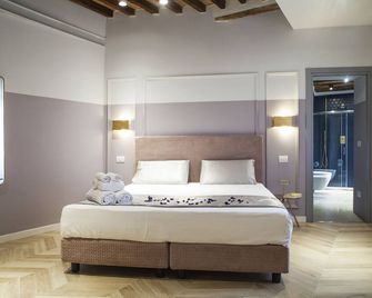 San Sebastiano Suite & Luxury Apartments - קולה די ואל ד'אלסה - חדר שינה