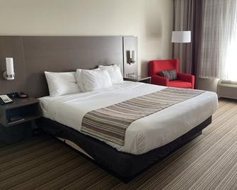 Country Inn & Suites by Radisson, Prairie Du Chien - Prairie du Chien - Спальня
