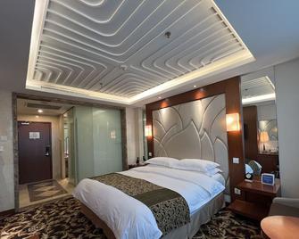 Howard Johnson Paragon Hotel Beijing - Beijing - Kamar Tidur