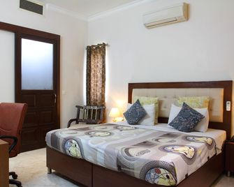 بيتش آرربور سويتس - جورجاون - غرفة نوم