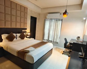 Hotel Magnum Inn - Jūnāgadh - Bedroom