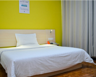 7Days Inn Jiaozuo Renmin Road Branch - Jiaozuo - Bedroom