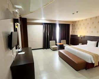 Grand Antares Hotel - Medan - Ložnice