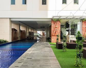 Studio Apartment with Cozy Design at B Residence By Travelio - Tangerang City - Building