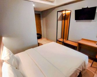 Studio One Thamrin Hotel - Jakarta - Bedroom