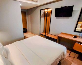 Studio One Thamrin Hotel - ג'קרטה - חדר שינה
