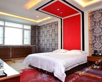 Nantian Business Hostel - Harbin - Bedroom