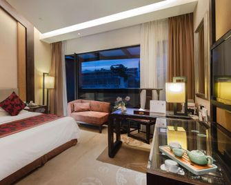 The Xianheng Hotel - שאושינג - חדר שינה