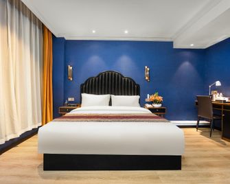 Yujing Saussurea French Style Hotel - Garzê - Habitación