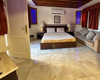 Green Garden Resort - Hurghada - Schlafzimmer