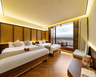Floral Hotel·Dream Home Hotel(Xueyun Street Branch) - Mudanjiang - Slaapkamer