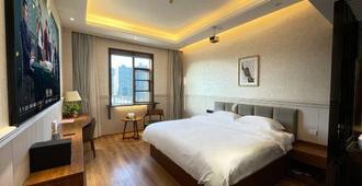 Hanzhong Ambassador Hotel - Hanzhong - Bedroom