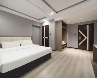 Tangfeng Art Hotel (Harbin Jiangpan) - Harbin - Chambre