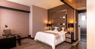 New World Suites - Bintulu - Bedroom