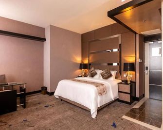 New World Suites - Bintulu - Bedroom