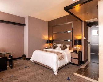New World Suites - Bintulu - Bedroom