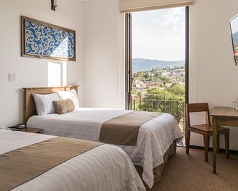 Hotel La Estacion - סן מיגל דה איינדה - חדר שינה