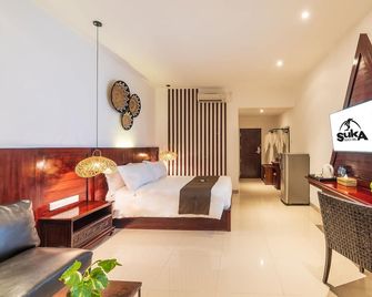 Suka Beach Inn - Kuta - Schlafzimmer
