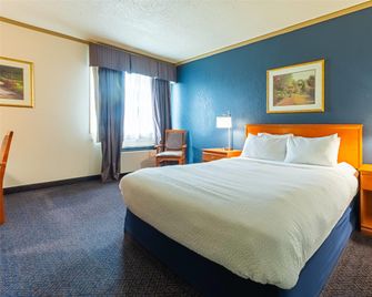 Days Inn by Wyndham Drayton Valley - Drayton Valley - Schlafzimmer