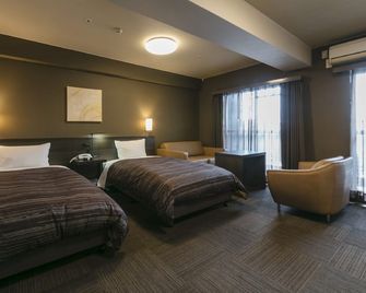 Hotel Route-Inn Kumamoto Ekimae - קומאמוטו - חדר שינה